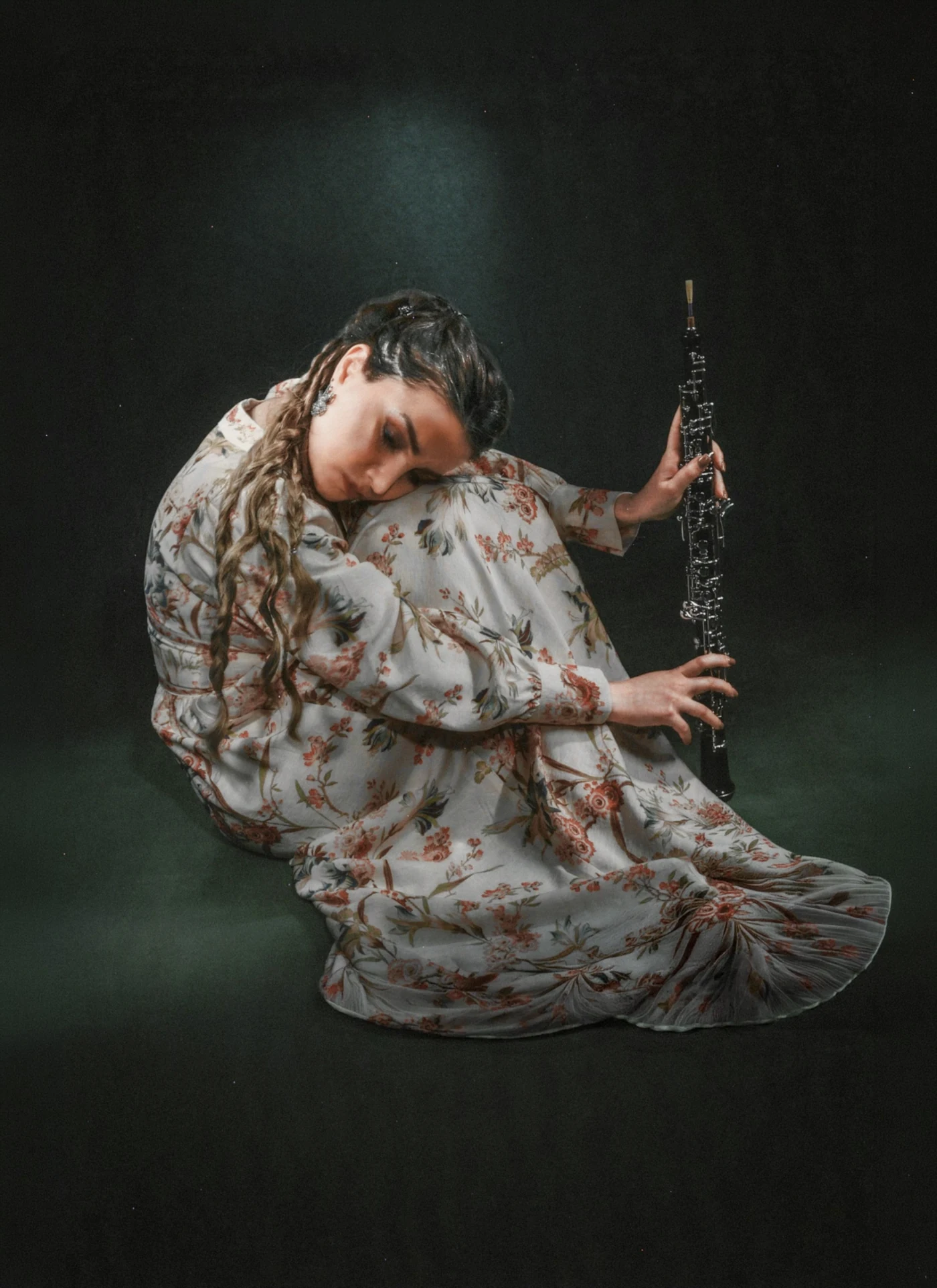 Lilit Margar with oboe in a creative portrait